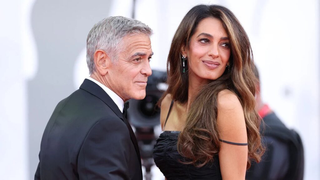 Amal Clooney regresa con glamour a la alfombra roja y comparte un tierno momento con George